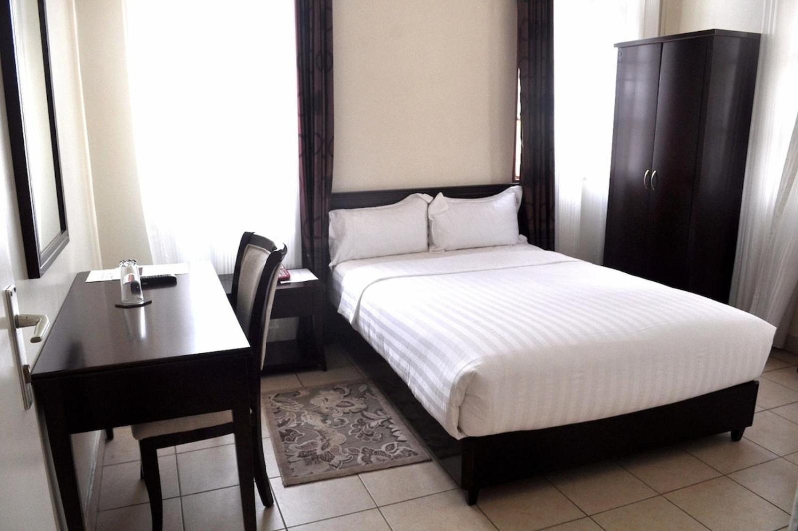 Quiet Haven Hotel Кигали Экстерьер фото