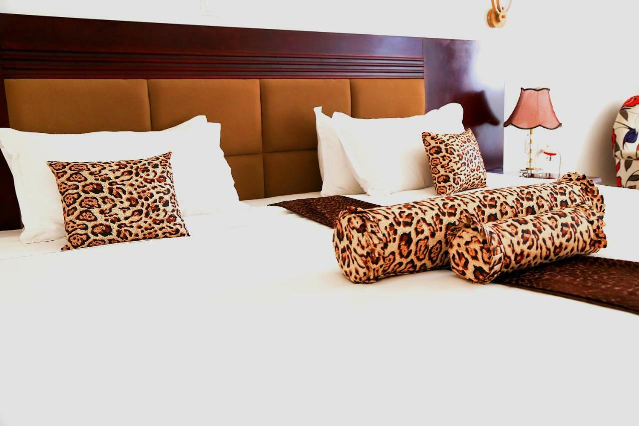 Quiet Haven Hotel Кигали Экстерьер фото